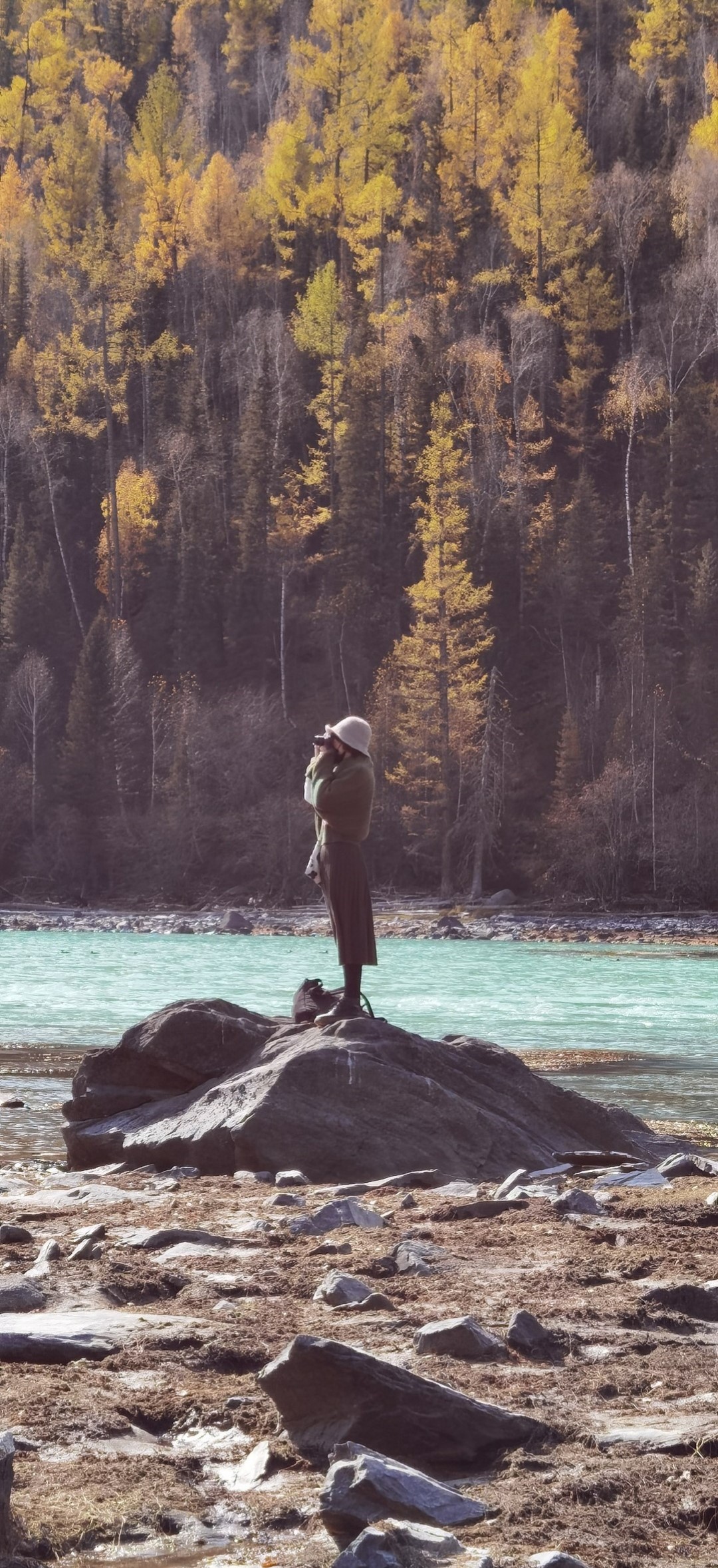 A girl is taking a photo